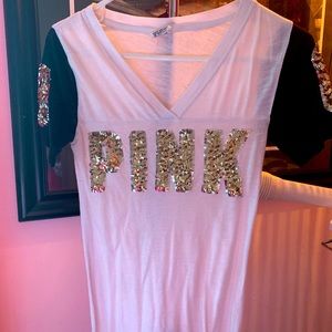 Pink brand white t-shirt trimmed in tons of sparkles! Size is XS